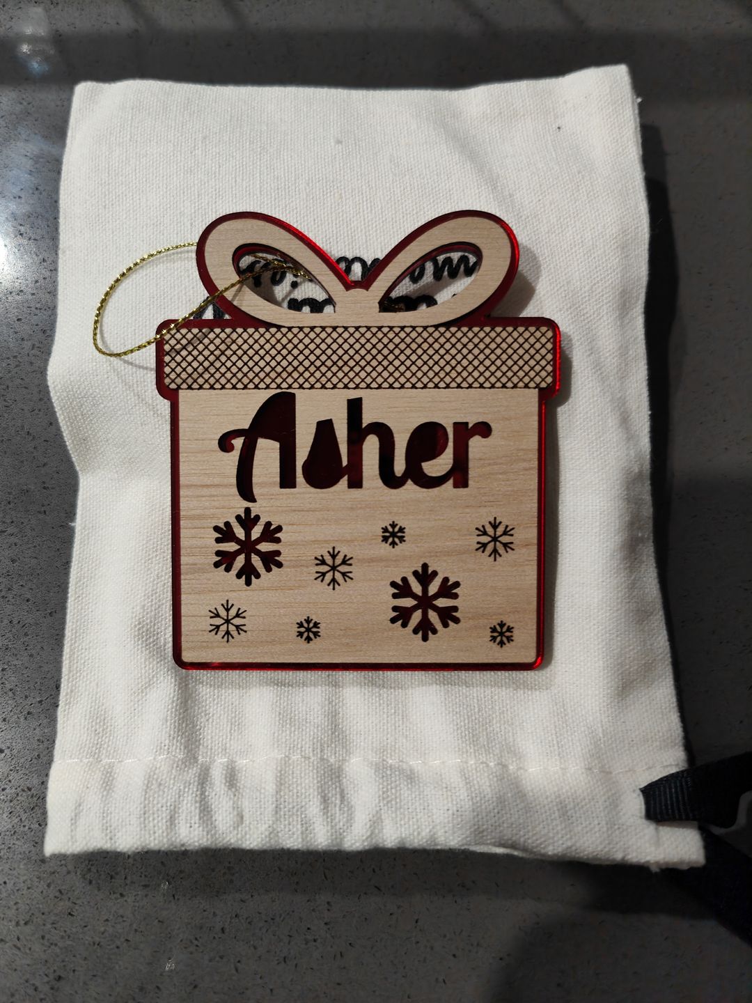 Customer photo review of Personalised Mirror and Wood Christmas Ornaments