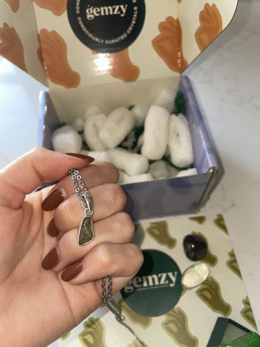 Customer photo review of Moldavite Pendants (Intuitively Selected)