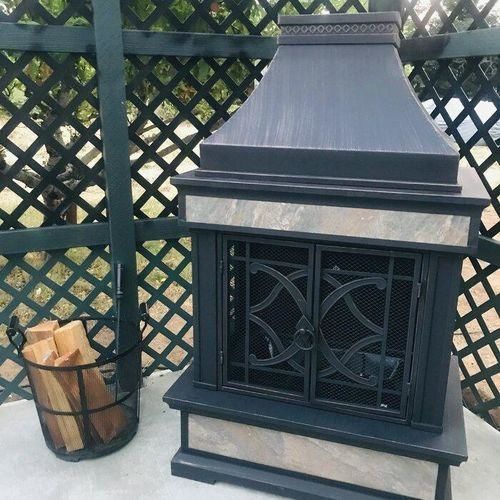 Customer photo review of Sunjoy Outdoor 57 in. Steel Wood Burning Fireplace with Fire Poker and Rain Cover