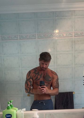 Customer photo review of Melanoboost Peptide Sun Tanning Lotion