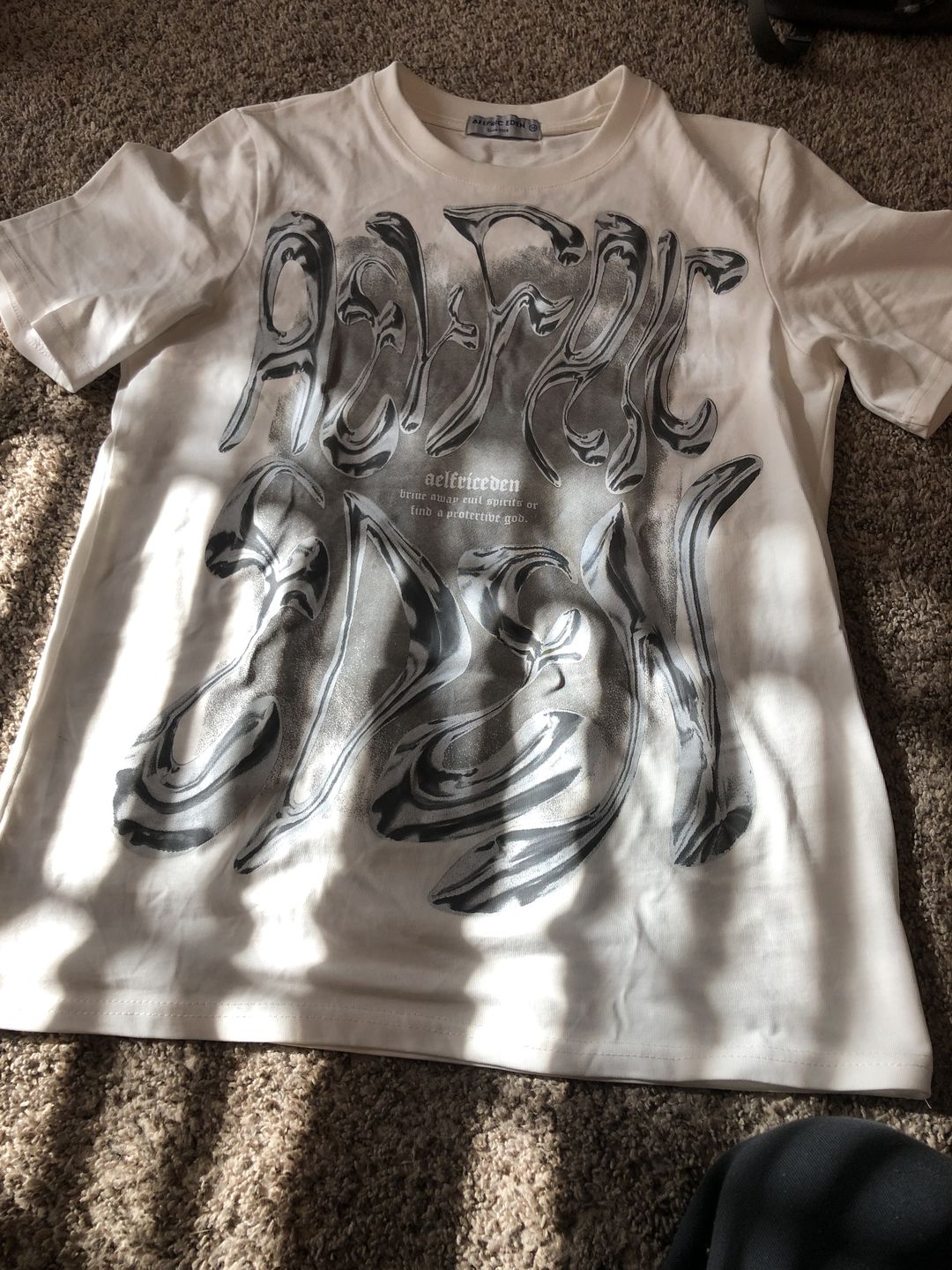 Customer photo review of Aelfric Eden Futuristic Liquid Metal Design Tee