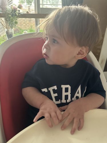 Customer photo review of FERAL College Kids Tee