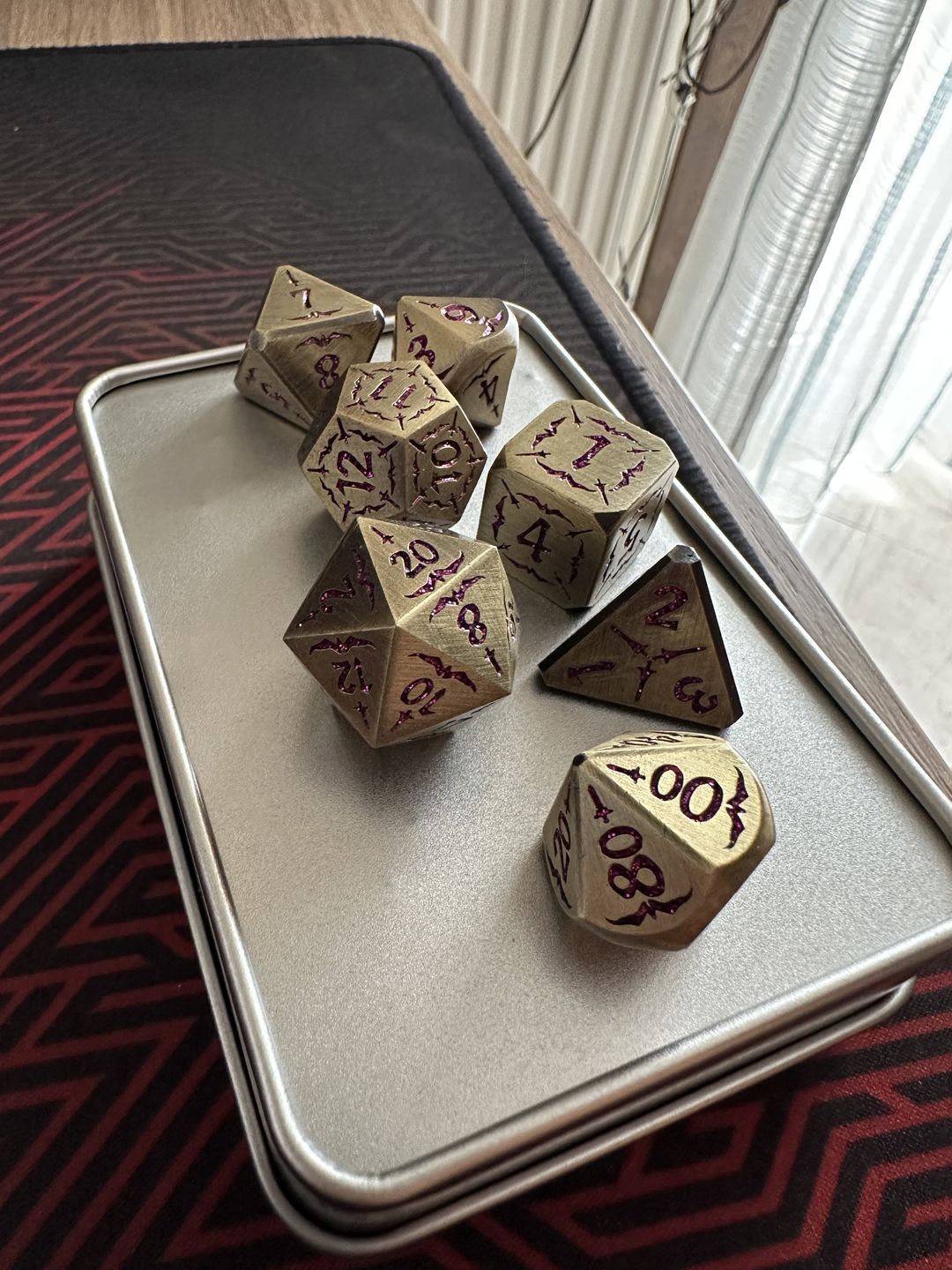 Customer photo review of Blade of the Maiden Metal Dice Set