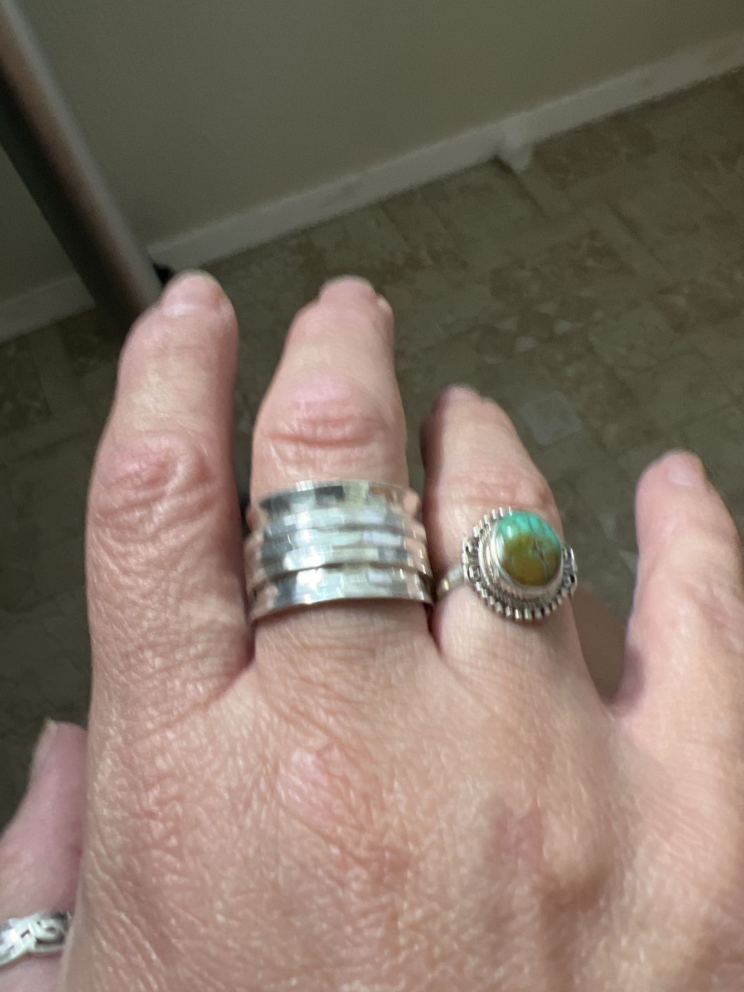 Customer photo review of Wide Band Silver Spinner Ring