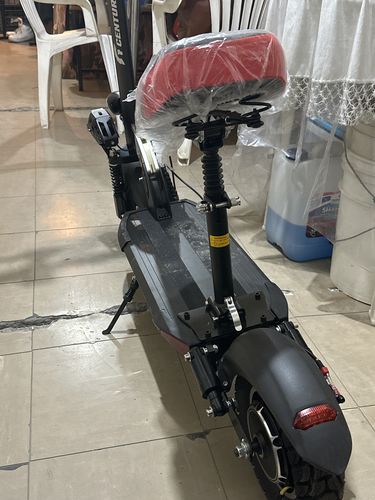 Customer photo review of Scooter Electrico Con Asiento Luz Led Usb Alarma 48 Km/h