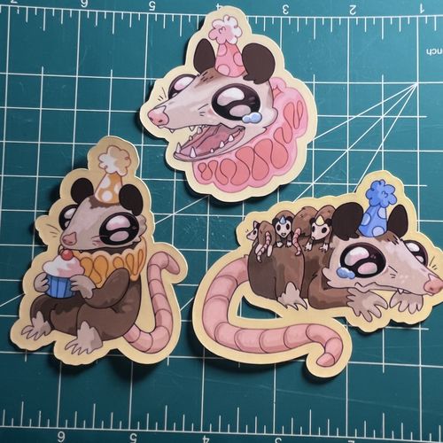 Customer photo review of Sad Party Opossum Stickers!