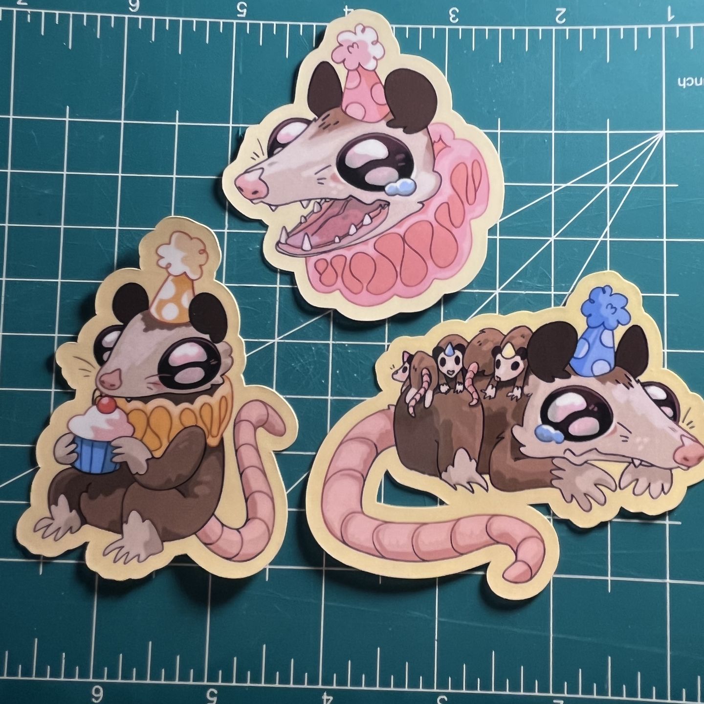 Customer photo review of Sad Party Opossum Stickers!