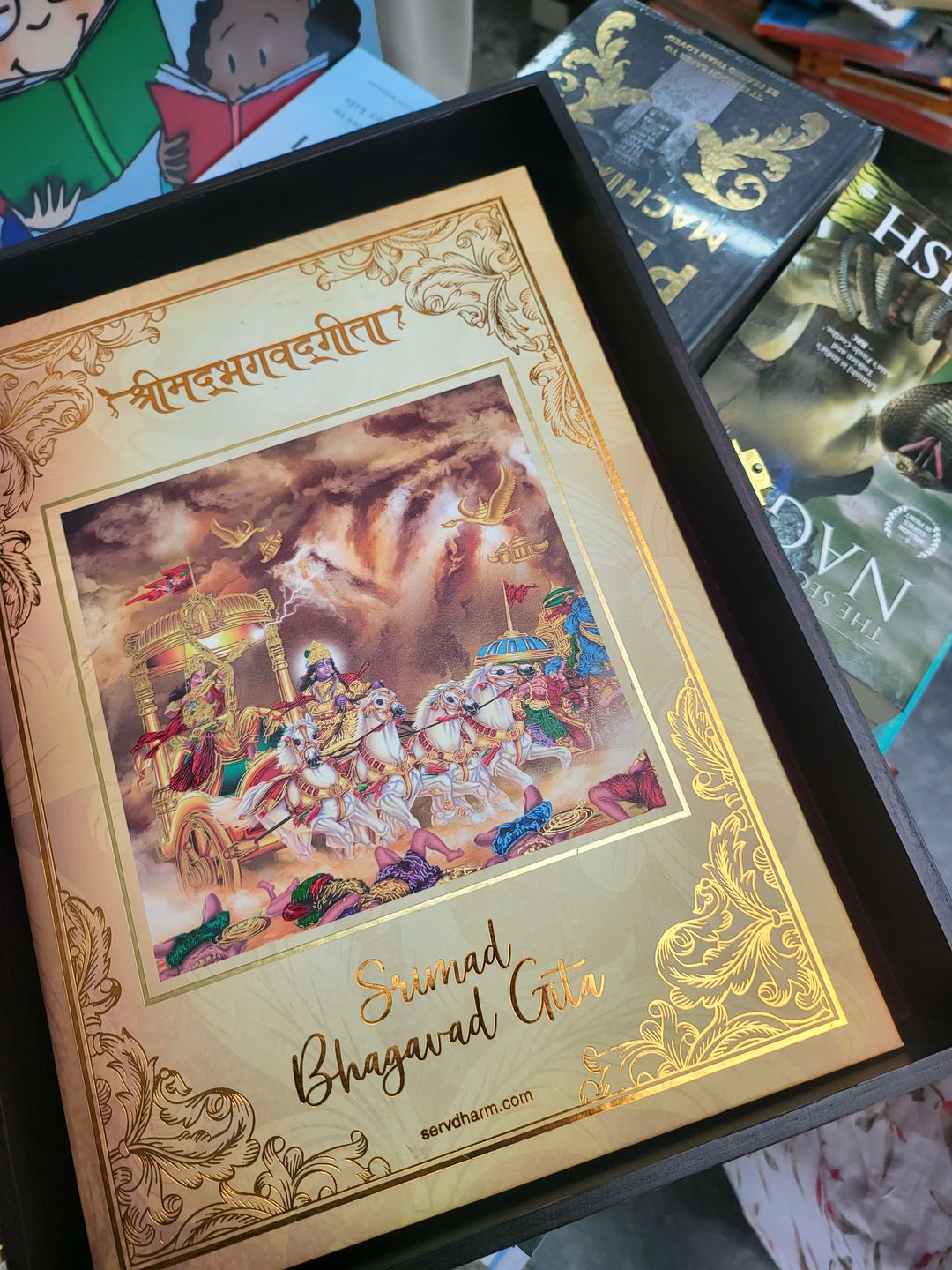 Customer photo review of Premium Bhagavad Gita in a Wooden Gift Box- (Lord Krishna and Arjuna Art on Box) Collector's Edition | 700 Original Verses in Sanskrit, Hindi and English Translation