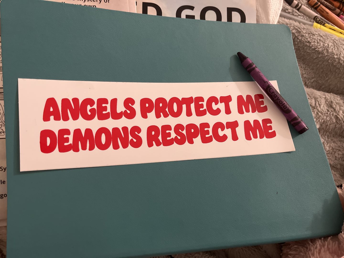 Customer photo review of Angels & Demons Sticker