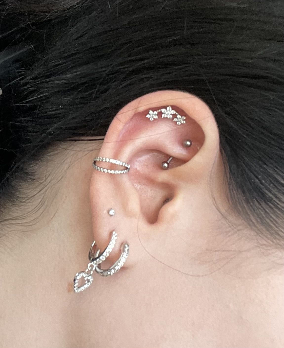 Customer photo review of Double Clicker Piercing | Titan