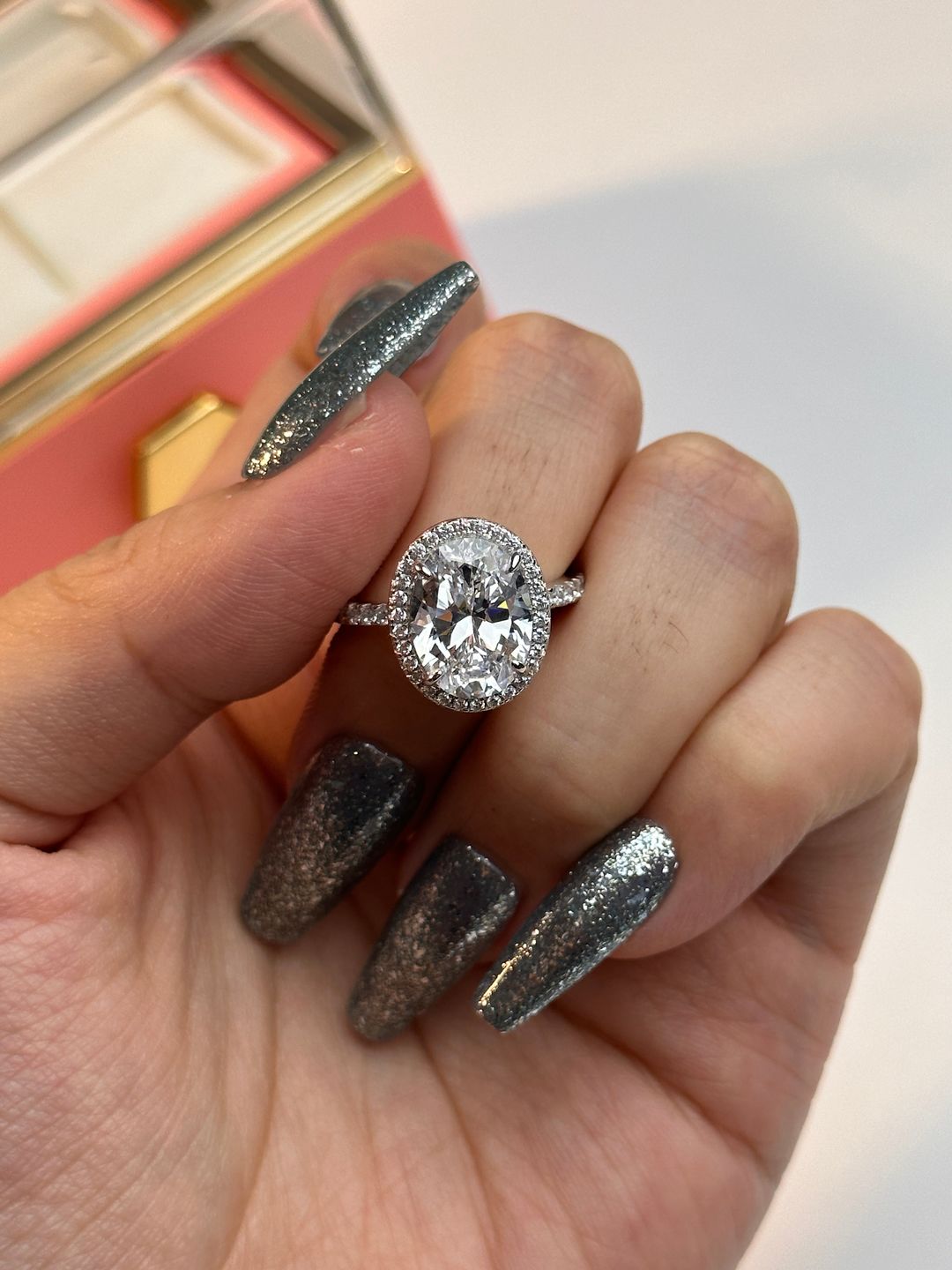 Customer photo review of Louily Halo 3.5Ct Oval Cut Simulated Diamond Engagement Ring In Sterling Silver