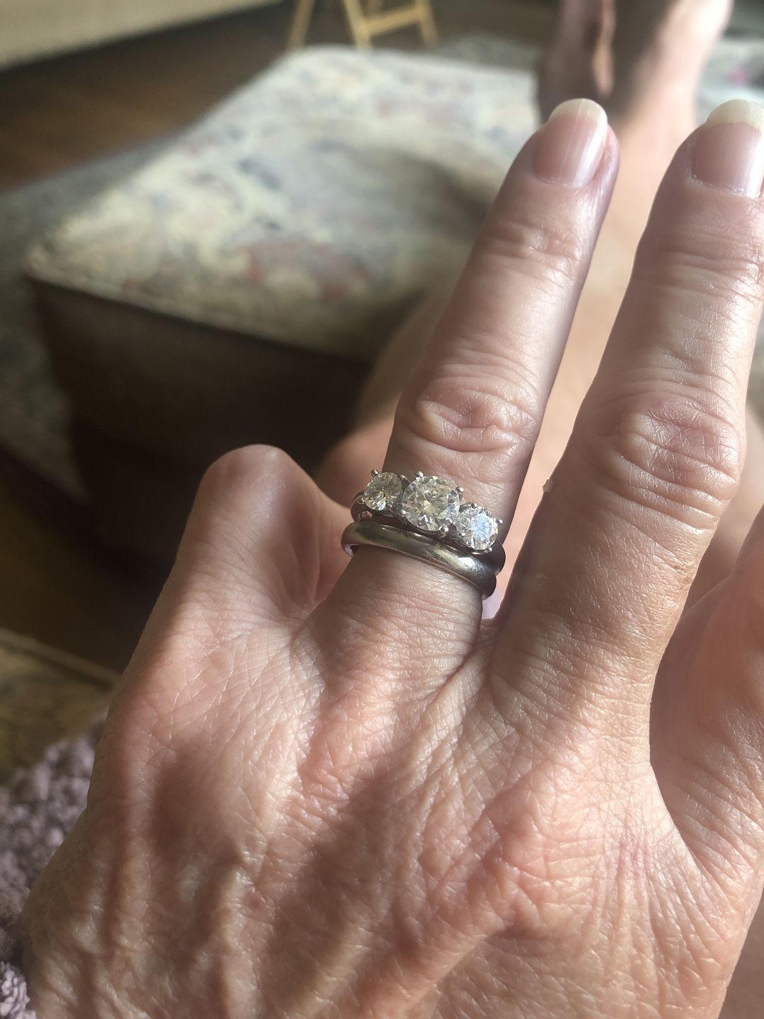 Customer photo review of Classic Three Stone Round Cut Moissanite Sterling Silver Wedding Ring