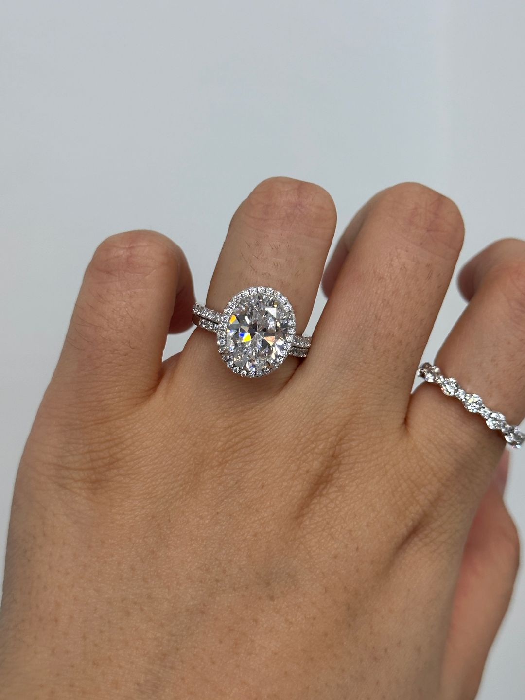 Customer photo review of Louily Halo 3.5Ct Oval Cut Simulated Diamond Engagement Ring In Sterling Silver