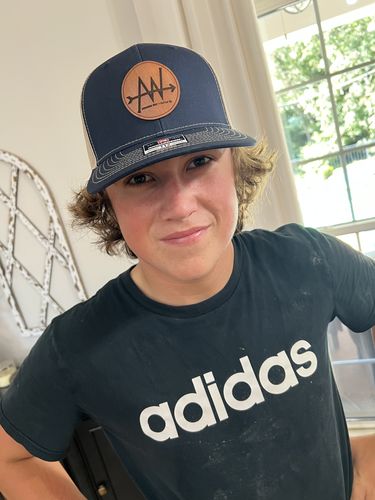 Customer photo review of Custom Leather Patch Trucker Hat - Richardson 112