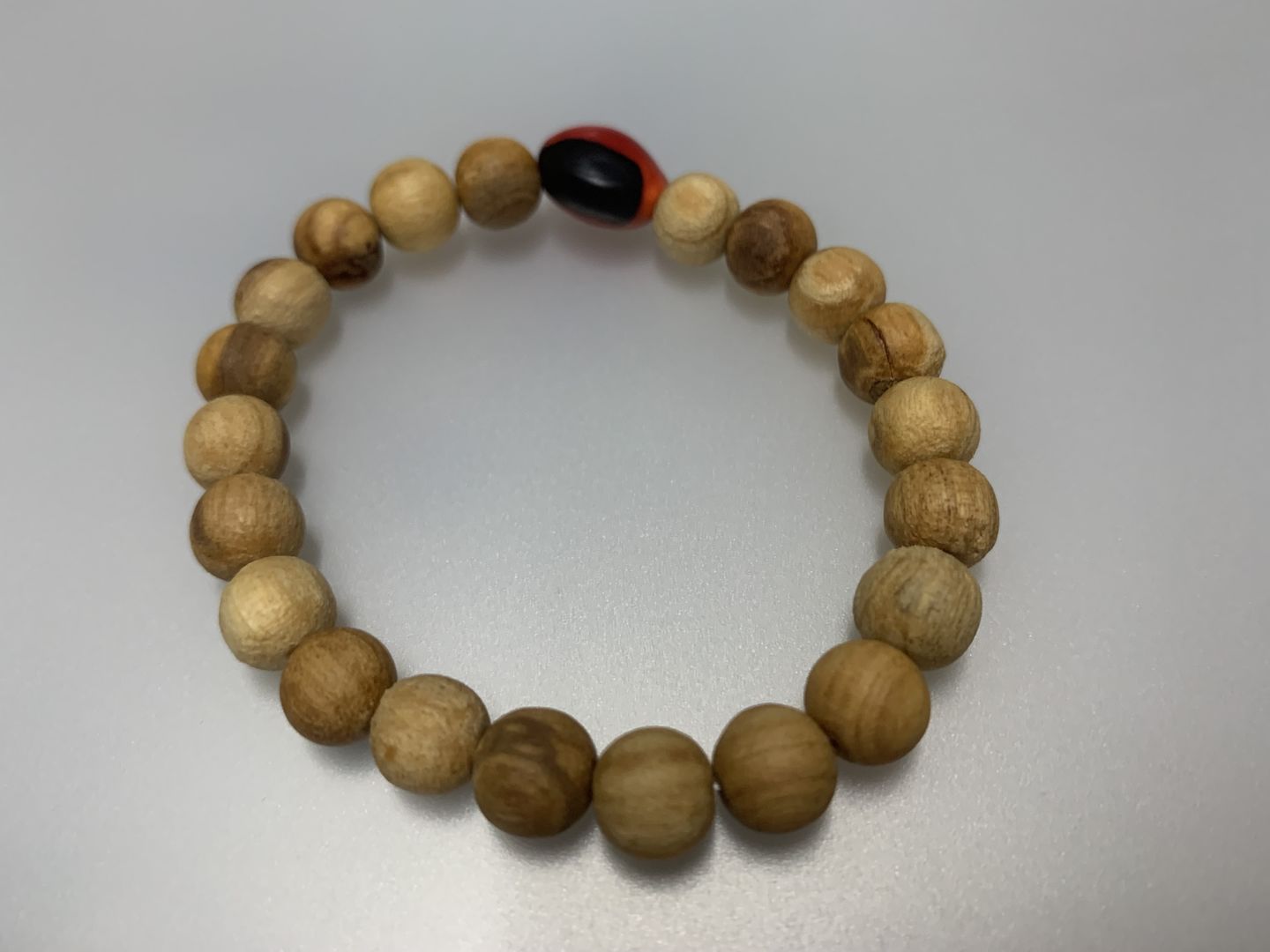 Customer photo review of Palo Santo and Huayruro Bracelet