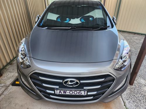 Customer photo review of Cartoon Angry Eyes Black Car Sunshade Custom Funny Accessories