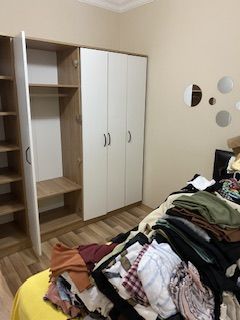 Customer photo review of Rani BA114 Geniş Gardırop Elbise Dolabı 6 Kapaklı 16 Raflı 2 Askılı Sepet Ceviz - Beyaz