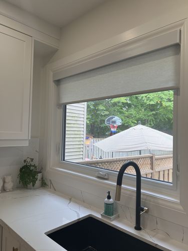 Customer photo review of SmartWings Motorized Light Filtering Roller Shades 70% Blackout Safari