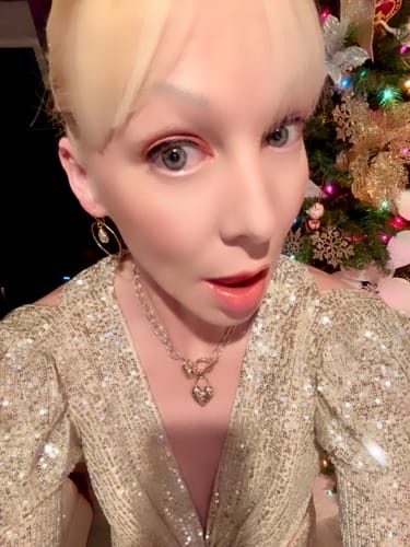 Customer photo review of Sequined Criss Cross Long Sleeve Gown