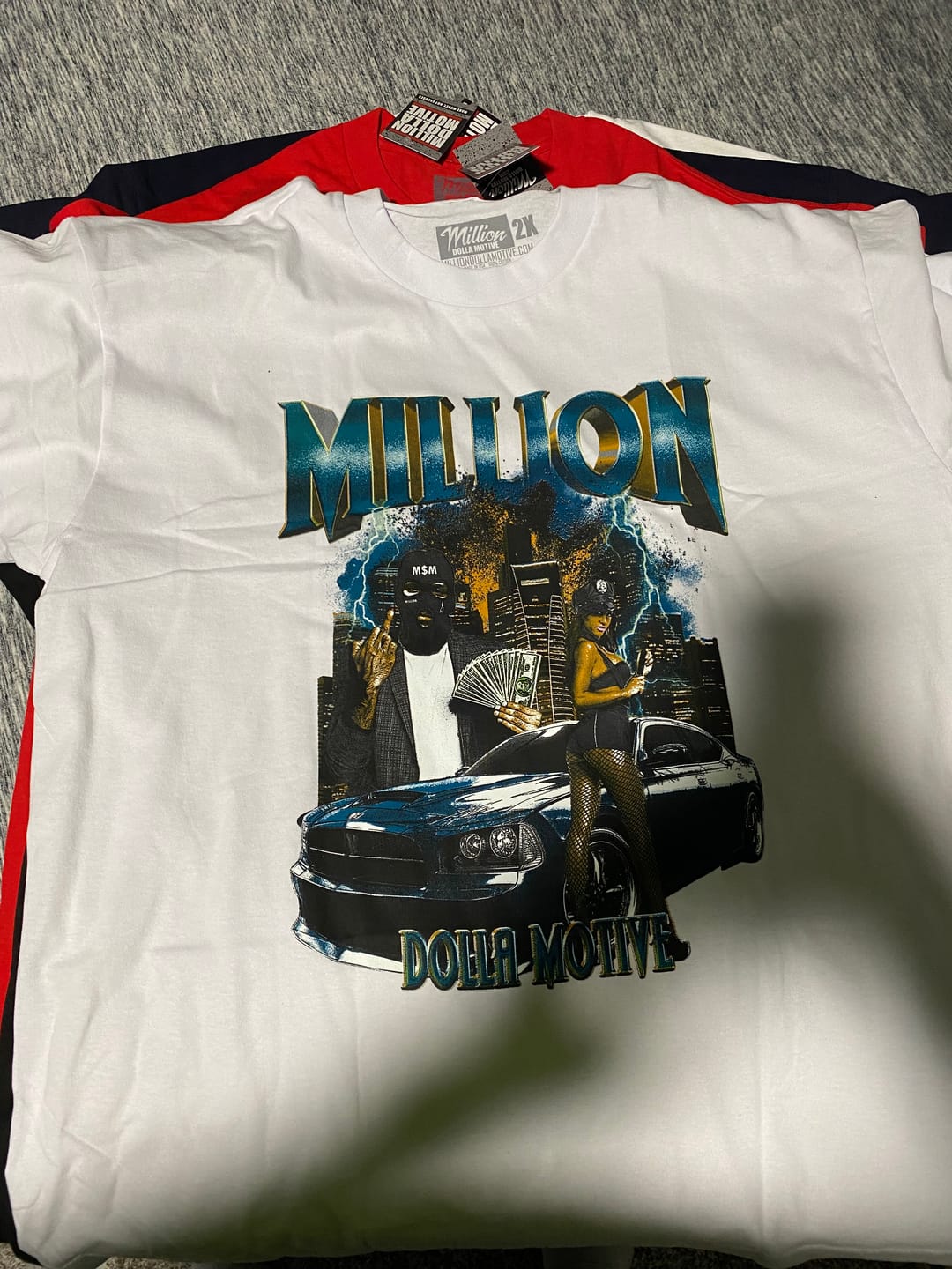 Customer photo review of Mystery Box of 12 T-Shirts