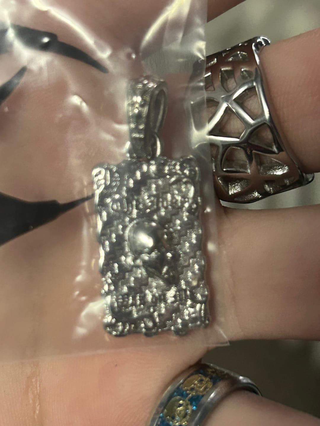 Customer photo review of LAUGH NOW, DIE LATER PENDANT