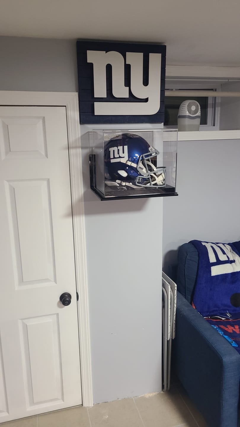 Customer photo review of Black Acrylic Wall Mounts - Better Display Cases
