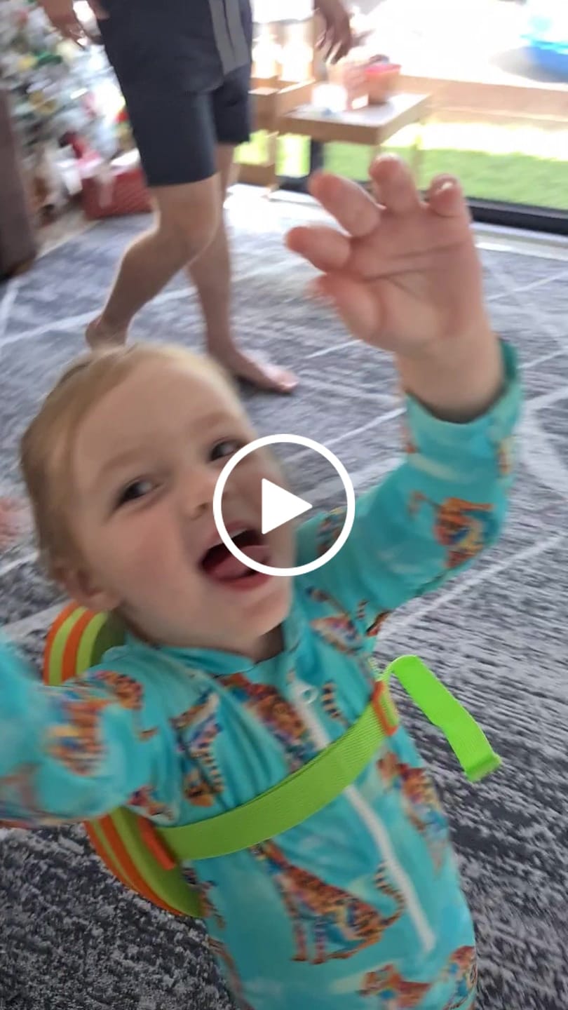 Customer video review of Shimmering Cheetah Unisex Long Sleeve Zip Swimmers
