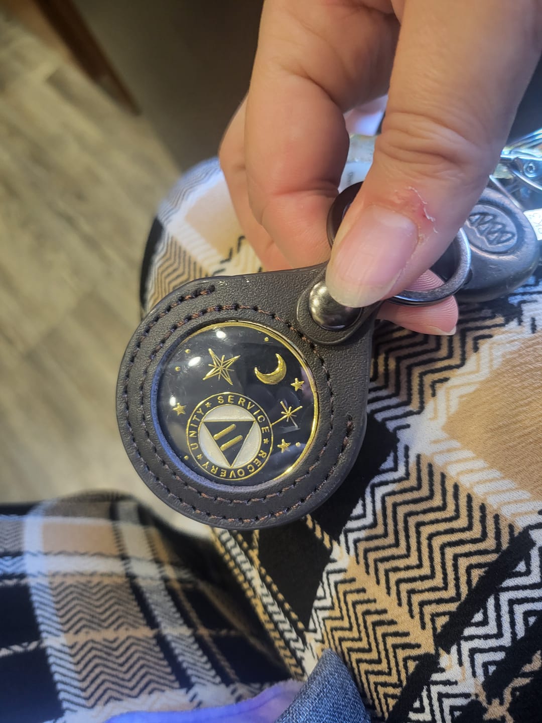 Customer photo review of 3 Year Sobriety Mint Twisted Flames Gold Plated AA Recovery Medallion - Three Year Chip/Coin - Black/Pink/Purple/Blue