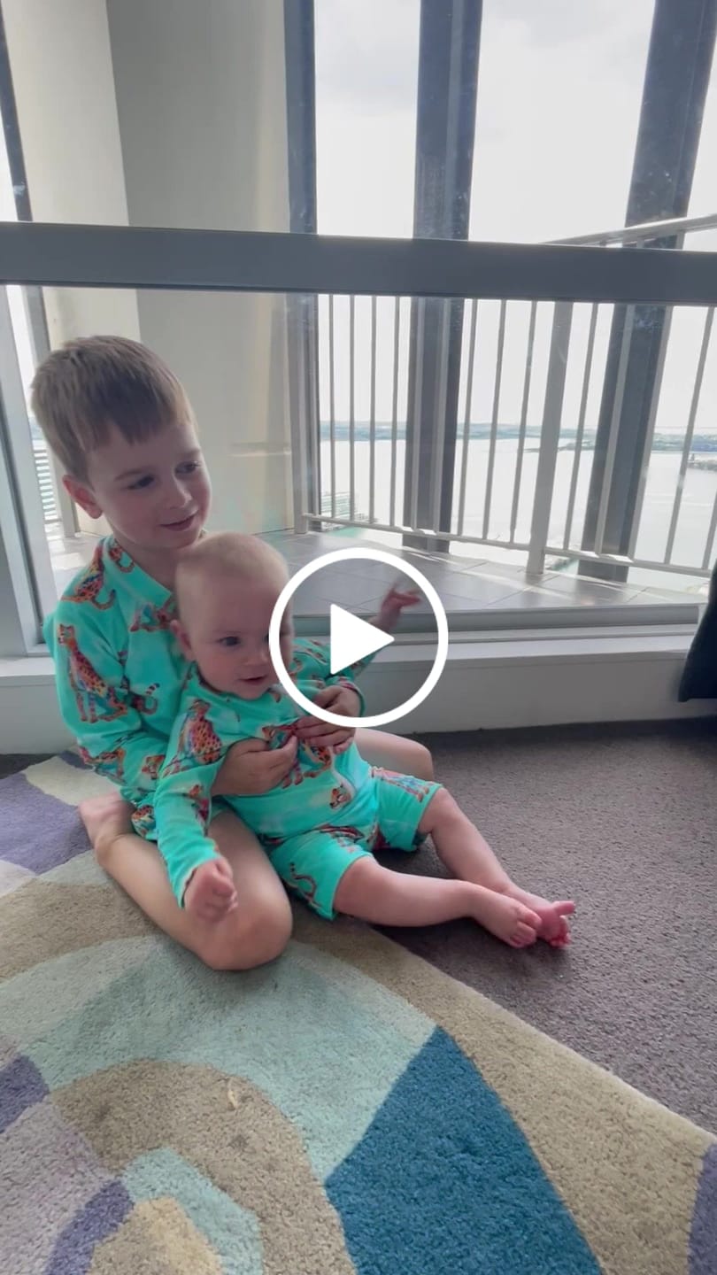 Customer video review of Shimmering Cheetah Unisex Long Sleeve Zip Swimmers