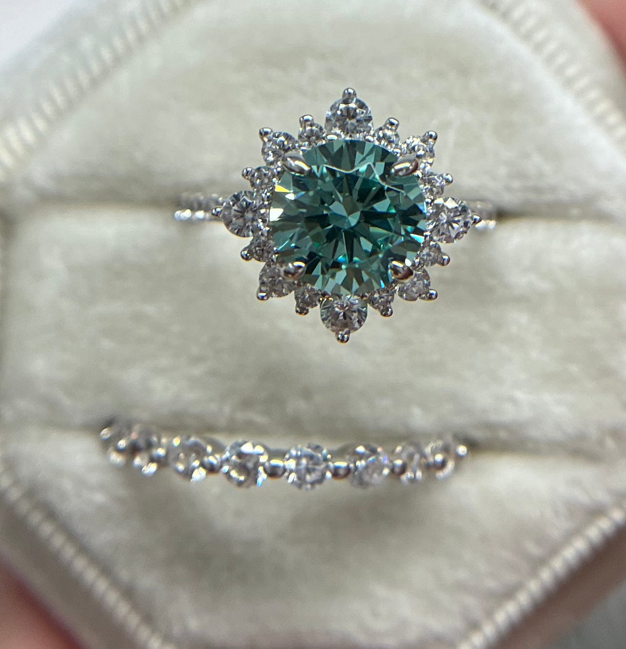 Customer photo review of S925 Moissanite 2 Ct Snowflake Design Halo Round Cyan Blue Stone Engagement Ring