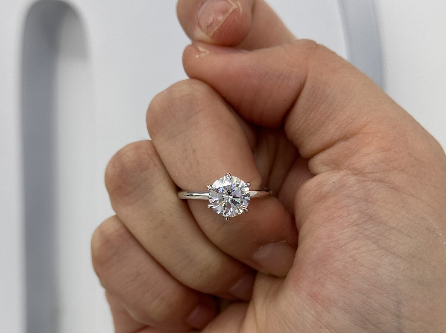 Customer photo review of S925 Moissanite/ Simulated Diamond 2.0 Carat Round Cut Solitaire Engagement Ring In Sterling Silver