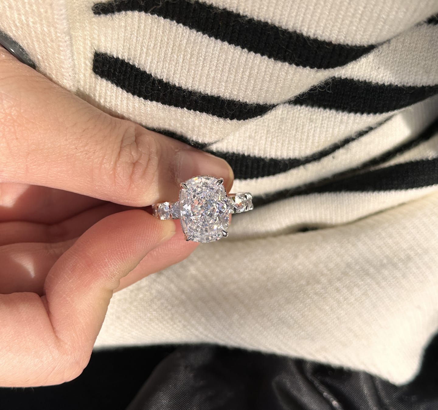 Customer photo review of Louily Gorgeous Elongated Crushed Ice Cushion Cut Engagement Ring