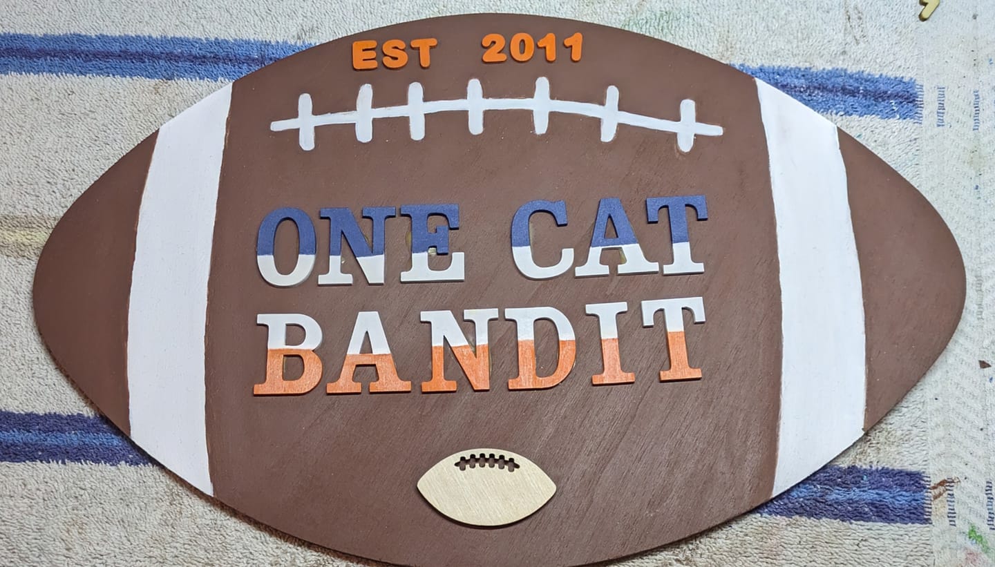 Customer photo review of Unfinished Wood Football Threads Shape - Sports Craft - up to 36" DIY