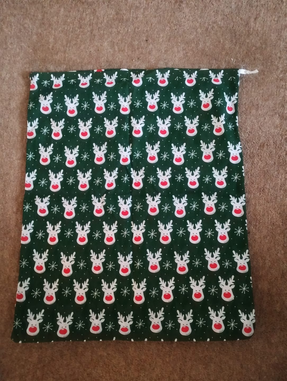 Customer photo review of White Reindeer Faces Polycotton Fabric