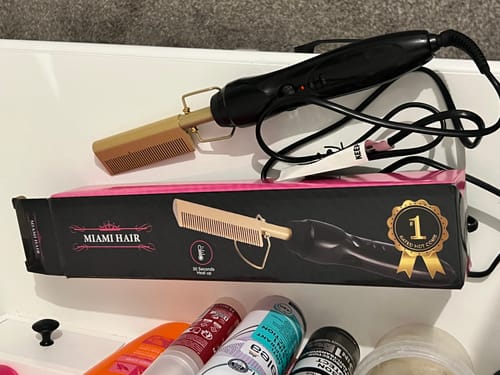 Customer photo review of CADEAU Peigne Lisseur Chauffant