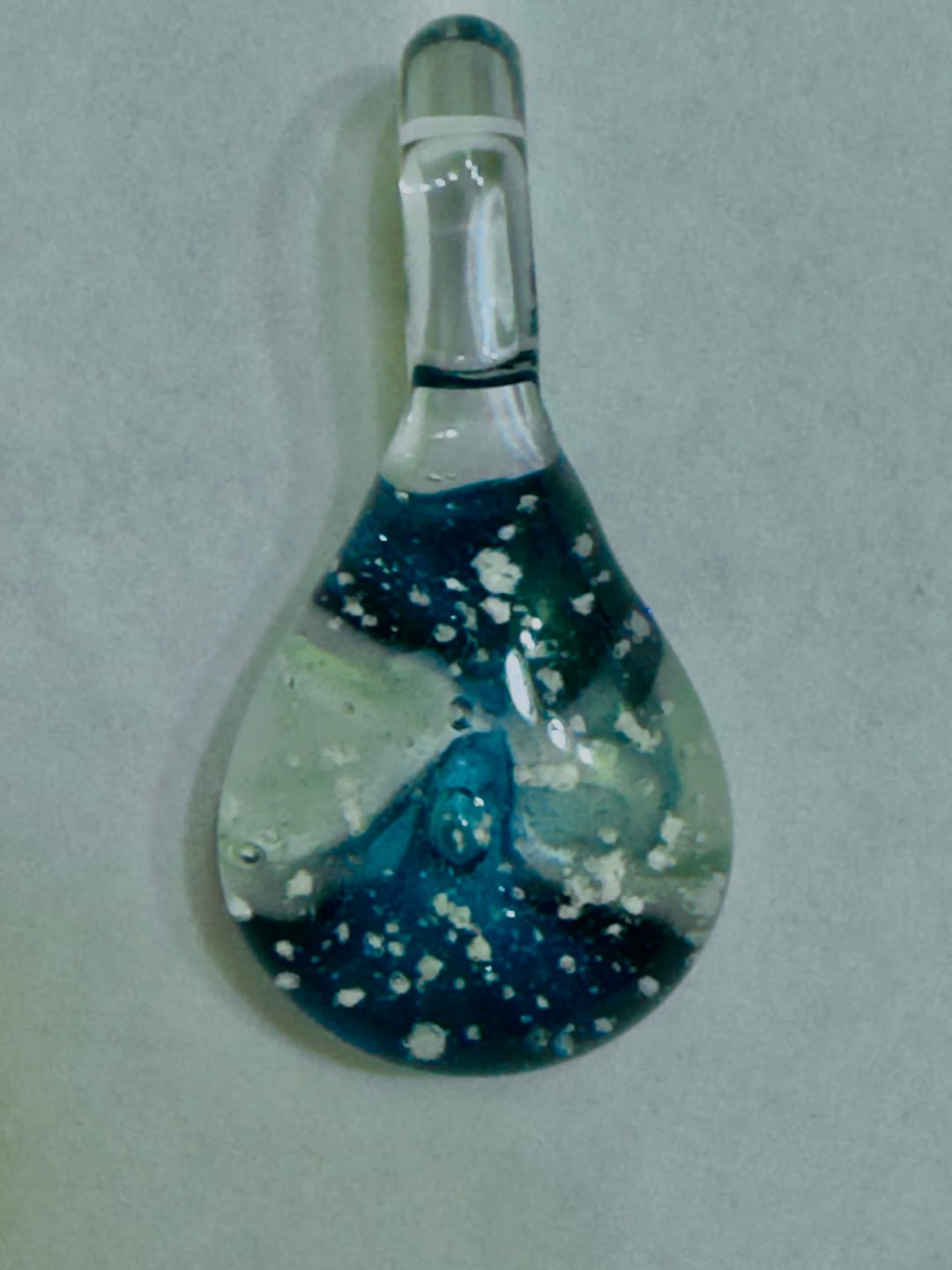 Customer photo review of Ocean Crash Pendant with Infused Cremation Ashes