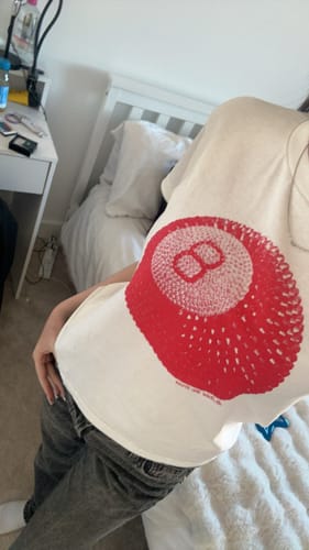 Customer photo review of 'Lucky Shot' baby tee