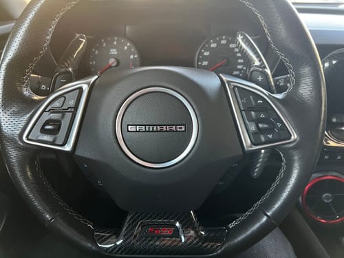 Customer photo review of 2016-2024 Camaro Carbon Fiber Lower Steering Wheel Emblem Trim Cover