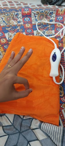 Customer photo review of Orthopaedic Heating Belt | Provides Heat Therapy to Soothe Sore Muscles | Decreases Joint Stiffness & Relieves Pain (Orange)