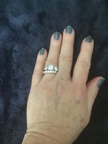 Customer photo review of Round Moissanite Sterling Silver Wedding Band Stackable Ring
