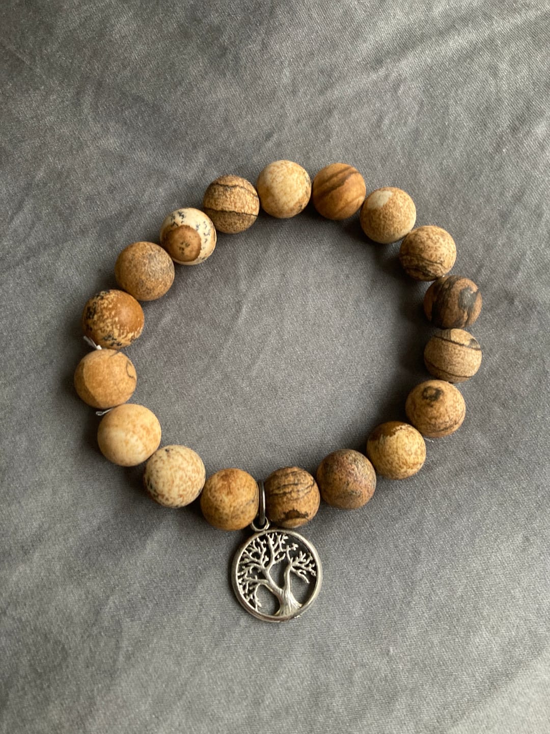 Customer photo review of Forgiveness Bracelet with Map Jasper and Grounding Tree of Life