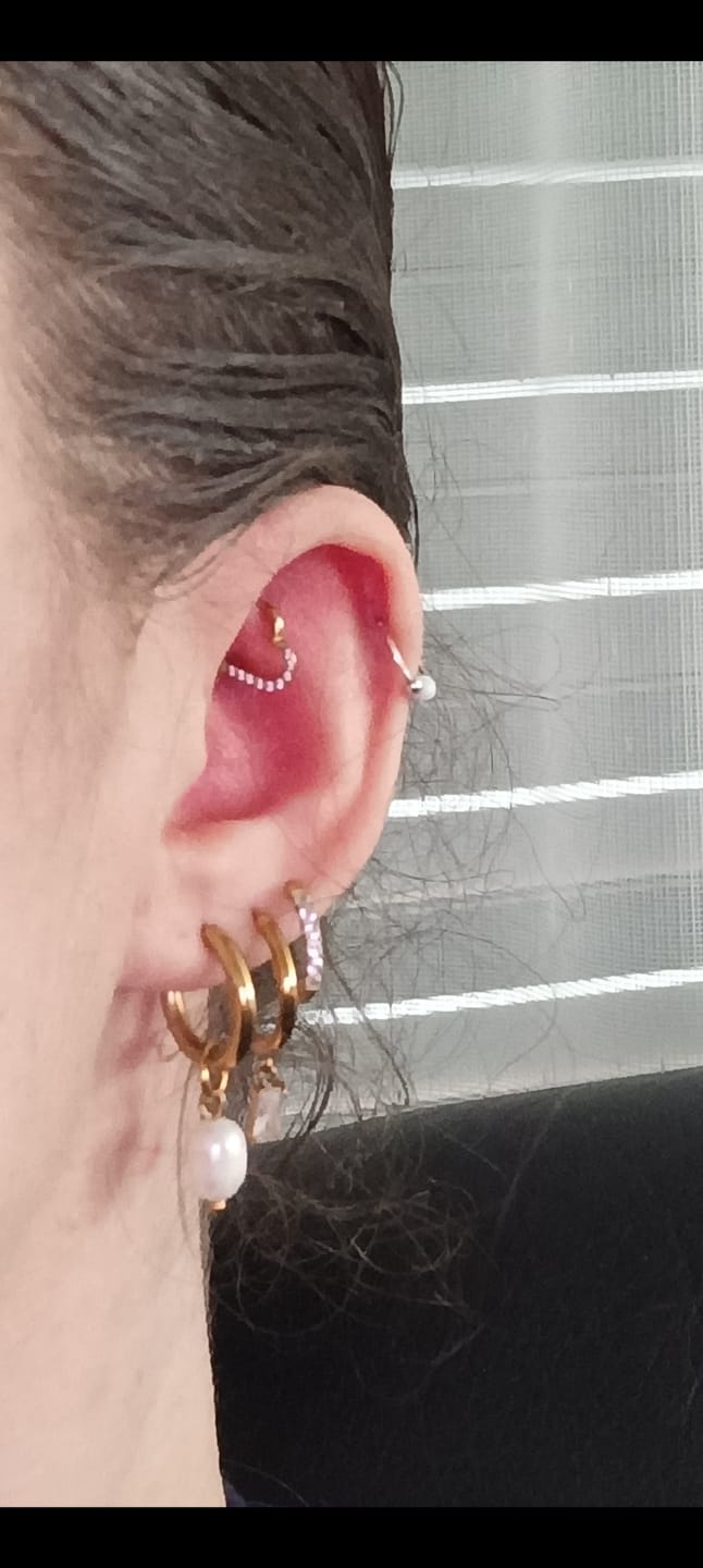 Customer photo review of Heart Clicker Piercing | Titan