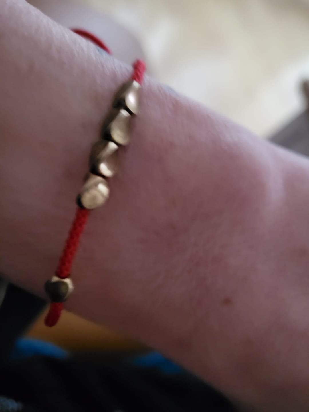 Customer photo review of Handgemachtes Tibetisches Glücks-Armband aus Kupfer