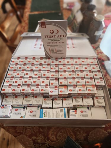 Customer photo review of First Aid Home Remedy Kit with Cell Salts, Self-Help Guide, and Full-Sized Bottles of Homeopathic Remedies - 15lb Briefcase Design White, 70 Bottles