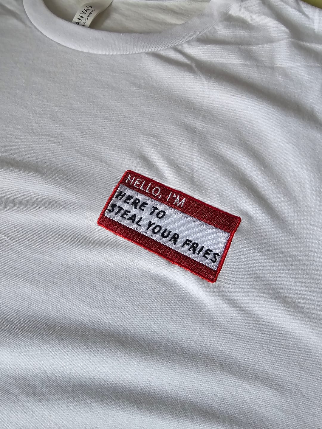 Customer photo review of HELLO I'M HERE TO STEAL YOUR FRIES - Name Tag T-Shirt