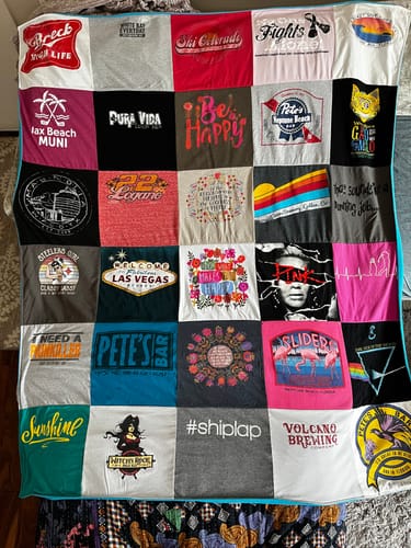 T-shirt quilt with travel, cheerfulness themes by Heidi from FL