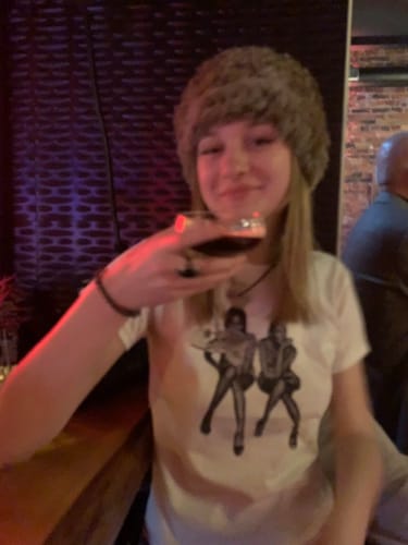 Customer photo review of 'After Party' premium baby tee