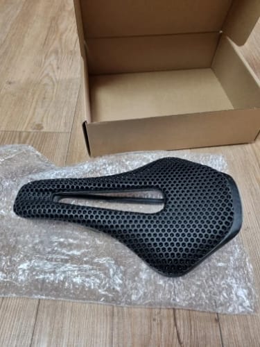 Customer photo review of CarbonXP Fiber Bicycle Saddle - 3D Printed Seat Cushion - Ultralight - Hollow Comfortable Breathable