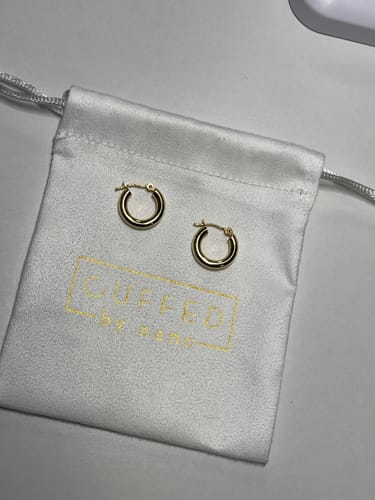 Customer photo review of 14k baby sophie hoops (3mm x 15mm)