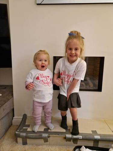 Customer photo review of Sisters Matching White T-shirts